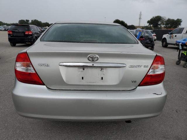 Photo 6 from auction – 2004 TOYOTA CAMRY LE with VIN 4T1BF30K14U571484
