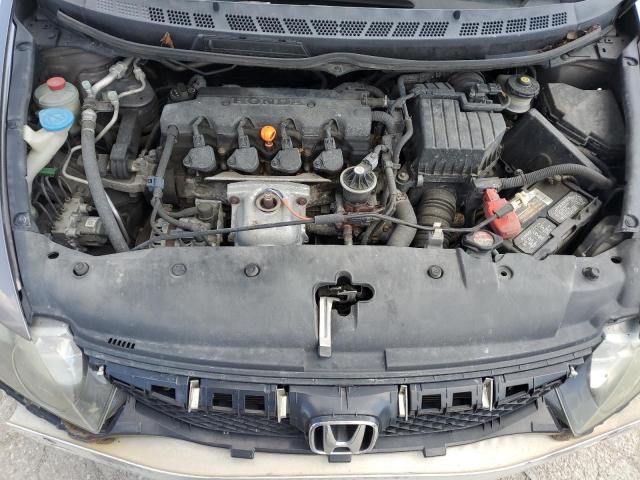Photo 11 from auction – 2011 HONDA CIVIC LX with VIN 19XFA1F50BE035079