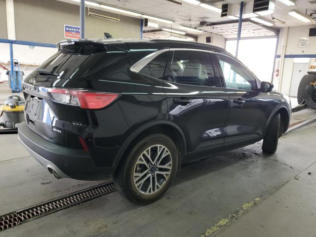 Photo 3 from auction – 2021 FORD ESCAPE SEL with VIN 1FMCU9H63MUB06354