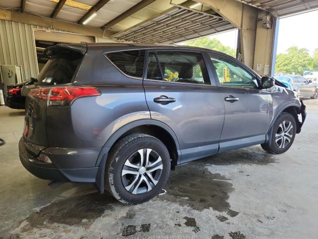 Photo 3 from auction – 2018 TOYOTA RAV4 LE with VIN 2T3BFREV3JW852436
