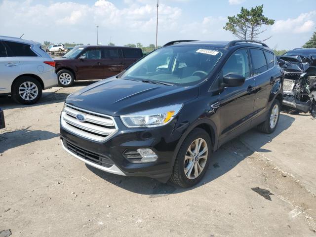 FORD ESCAPE SE 2018 with VIN 1FMCU9GD5JUC31951 - Photo from auction