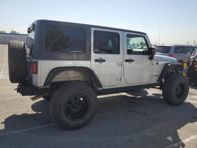 Foto 3 de la subasta – 2011 JEEP WRANGLER U con VIN 1J4BA5H16BL521963