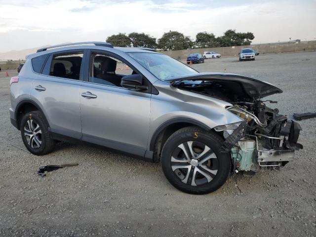 Photo 4 from auction – 2018 TOYOTA RAV4 LE with VIN JTMZFREV0JJ191283