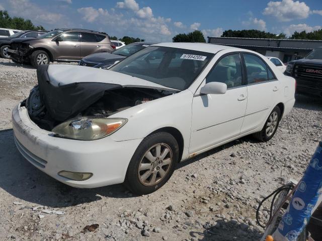 TOYOTA CAMRY LE 2004 with VIN 4T1BE32K74U340248 - Photo from auction
