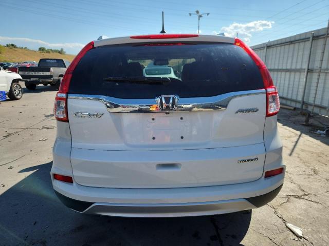 Photo 6 from auction – 2016 HONDA CR-V TOURI with VIN 5J6RM4H90GL013825