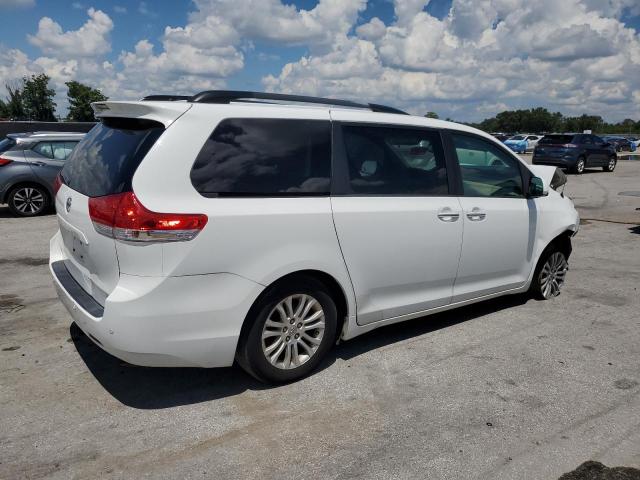 Photo 3 from auction – 2014 TOYOTA SIENNA XLE with VIN 5TDYK3DC6ES444572