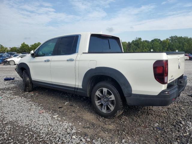 Photo 2 from auction – 2019 HONDA RIDGELINE with VIN 5FPYK3F77KB009082