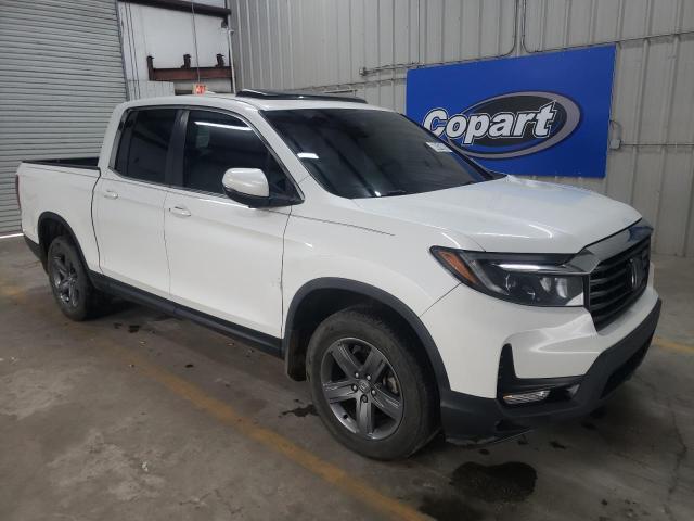 Photo 4 from auction – 2022 HONDA RIDGELINE with VIN 5FPYK3F57NB007416