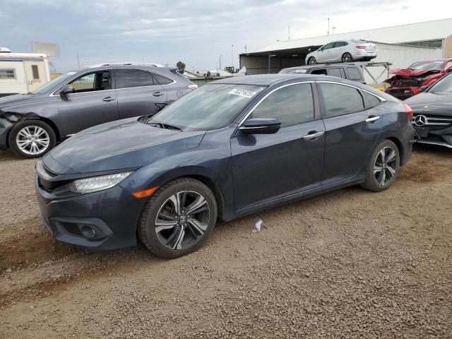 HONDA CIVIC TOUR 2017 with VIN 2HGFC1F92HH650907 - Photo from auction