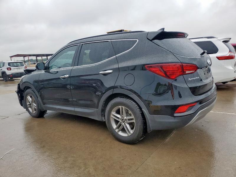 Photo 2 from auction – 2018 HYUNDAI SANTA FE S with VIN 5NMZU3LB8JH058238
