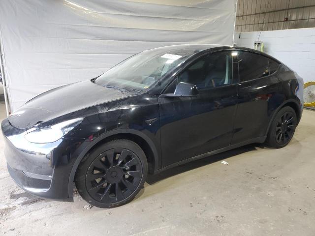 TESLA MODEL Y 2022 with VIN 7SAYGAEE6NF323926 - Photo from auction