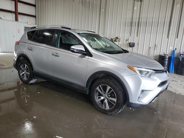 Photo 4 from auction – 2016 TOYOTA RAV4 XLE with VIN 2T3RFREV6GW512009