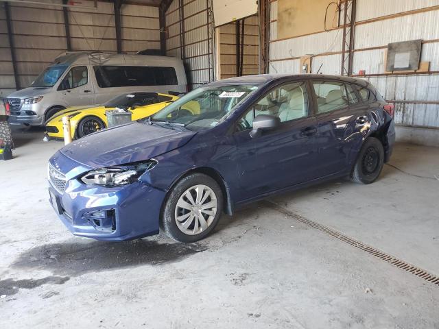 SUBARU IMPREZA 2017 with VIN 4S3GTAA65H3750180 - Photo from auction