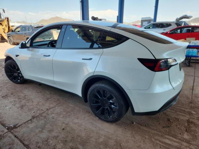 Photo 2 from auction – 2023 TESLA MODEL Y with VIN 7SAYGDEE0PA050659