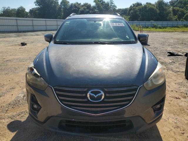 Photo 5 from auction – 2016 MAZDA CX-5 TOURI with VIN JM3KE2CY0G0622817