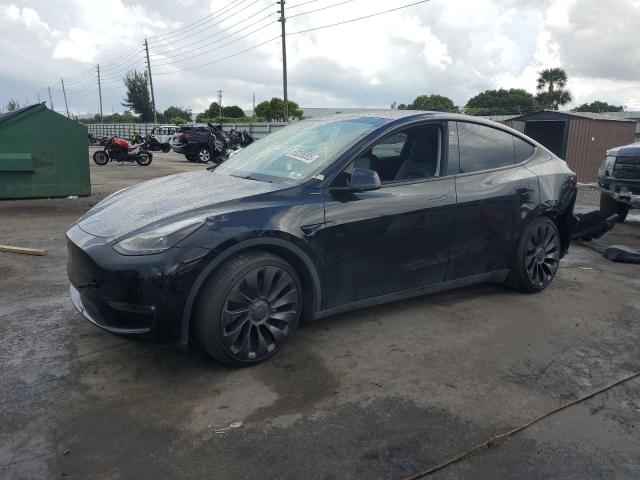 TESLA MODEL Y 2023 с VIN 7SAYGDEF8PF611802 - Фото с аукциона