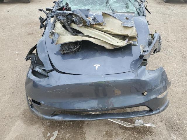 Photo 11 from auction – 2023 TESLA MODEL Y with VIN 7SAYGDEE7PF752951