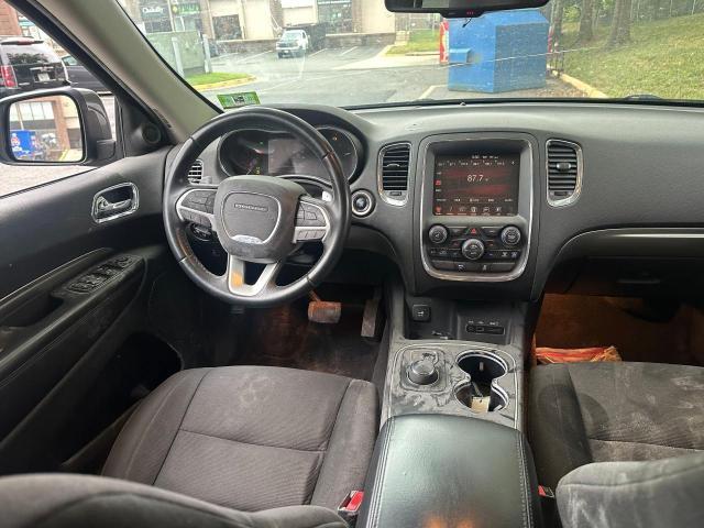 Photo 9 from auction – 2015 DODGE DURANGO SX with VIN 1C4RDJAG8FC710154