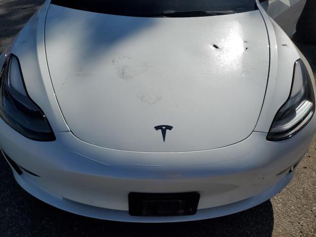 Photo 11 from auction – 2022 TESLA MODEL 3 with VIN 5YJ3E1EA1NF332804