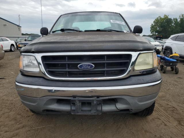 Photo 5 from auction – 2002 FORD F150 with VIN 1FTRX18W82NA51690