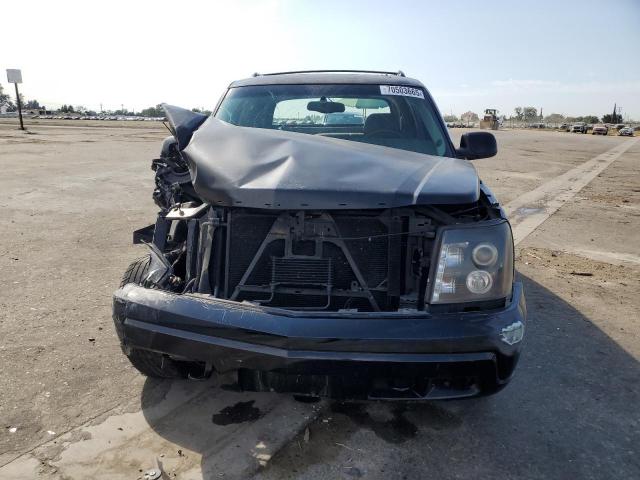 Photo 5 from auction – 2002 CADILLAC ESCALADE EXT with VIN 3GYEK63N52G275415