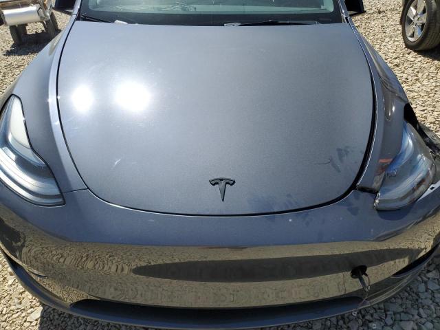 Photo 12 from auction – 2022 TESLA MODEL Y with VIN 7SAYGDEE0NF536436