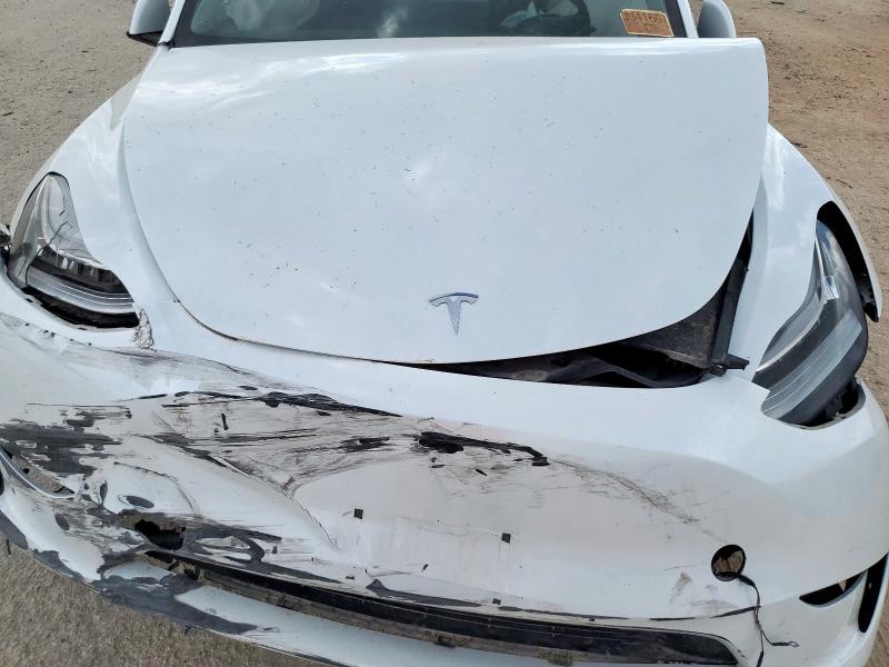 Foto 11 de la subasta – 2023 TESLA MODEL Y con VIN 7SAYGDEE7PA094304