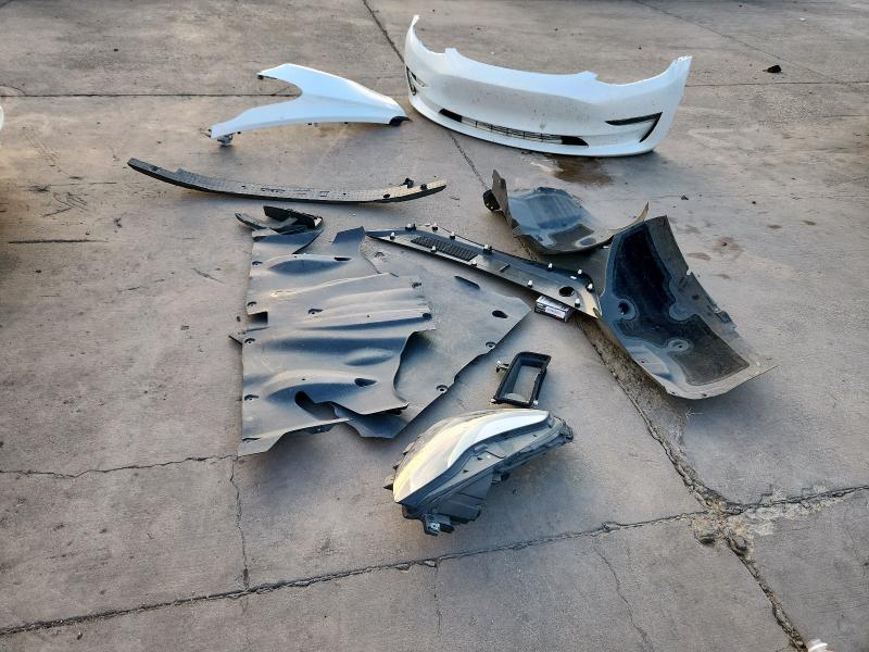 Photo 12 from auction – 2022 TESLA MODEL 3 with VIN 5YJ3E1EB0NF166459