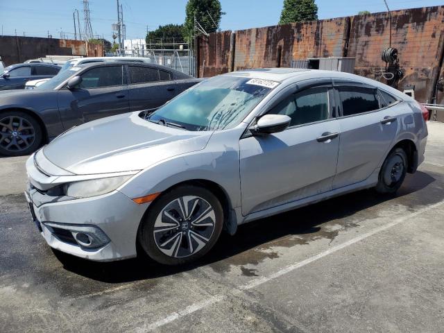 Photo 1 from auction – 2017 HONDA CIVIC EX with VIN 2HGFC1F30HH654210