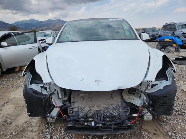 Photo 5 from auction – 2022 TESLA MODEL Y with VIN 7SAYGDEE7NF435698