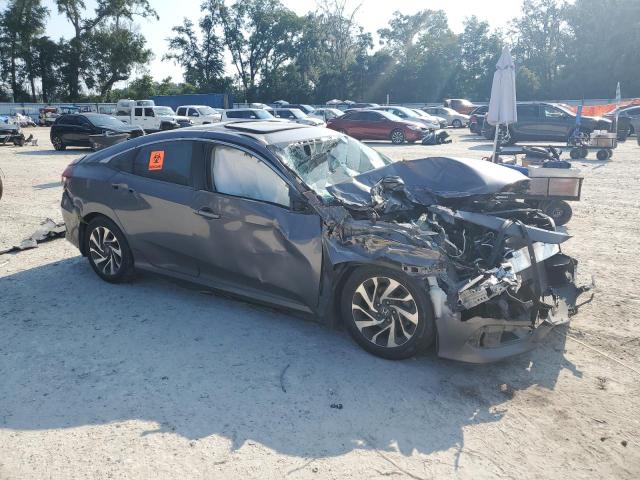 Photo 4 from auction – 2018 HONDA CIVIC EX with VIN 19XFC2F70JE024535
