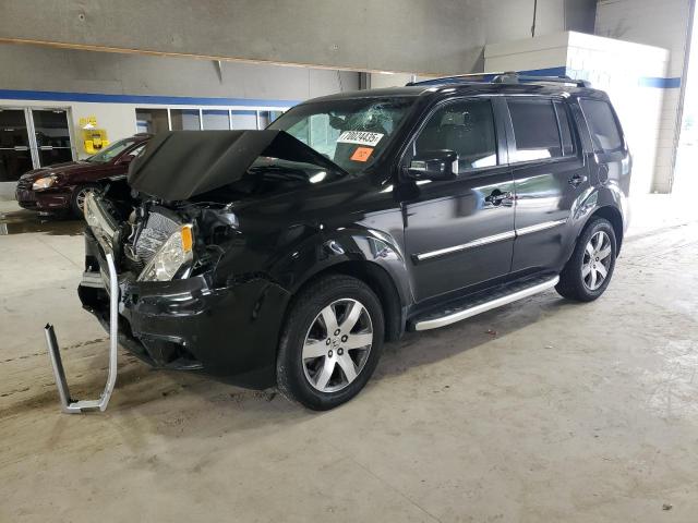 HONDA PILOT TOUR 2014 with VIN 5FNYF4H93EB023910 - Photo from auction