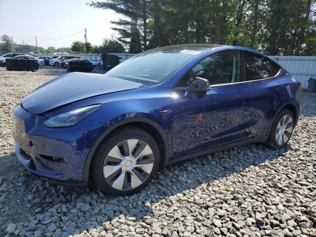 TESLA MODEL Y 2023 with VIN 7SAYGDEEXPF799472 - Photo from auction