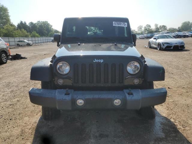 Photo 5 from auction – 2015 JEEP WRANGLER U with VIN 1C4BJWDG6FL571841