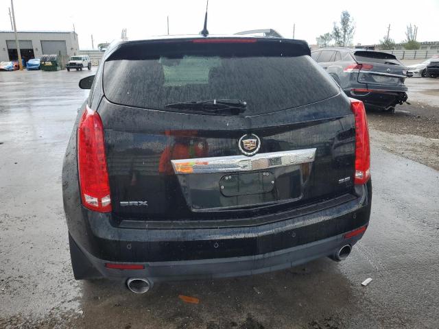 Photo 6 from auction – 2013 CADILLAC SRX PERFOR with VIN 3GYFNDE34DS650867