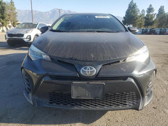 Photo 5 from auction – 2018 TOYOTA COROLLA L with VIN 5YFBURHE6JP848831