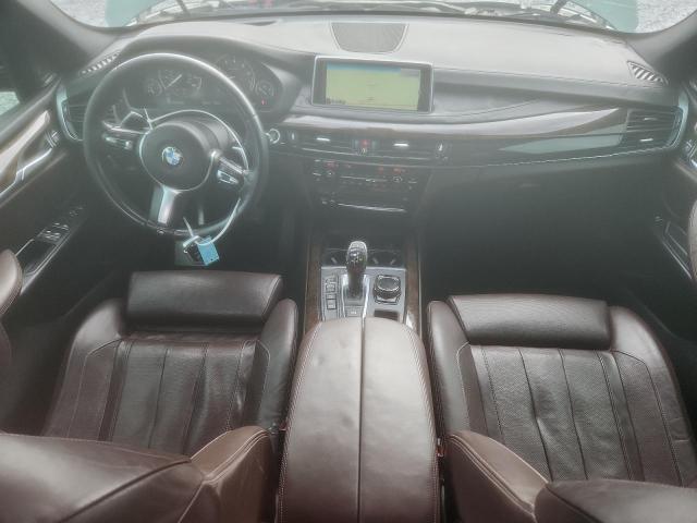 Photo 8 from auction – 2014 BMW X5 XDRIVE5 with VIN 5UXKR6C52E0C02386