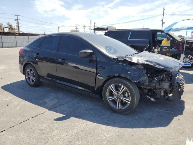 Photo 4 from auction – 2018 FORD FOCUS SE with VIN 1FADP3FEXJL313161