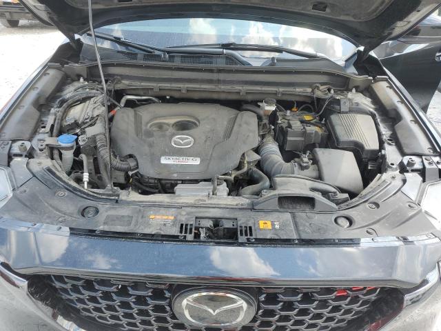 Photo 11 from auction – 2023 MAZDA CX-5 with VIN JM3KFBAY4P0126077