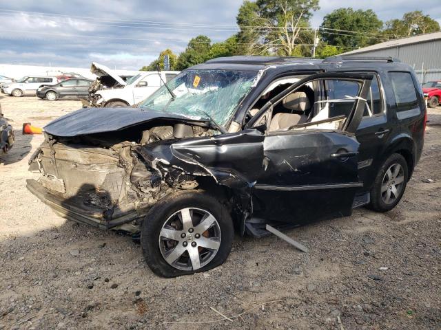 HONDA PILOT TOURING 2012 con VIN 5FNYF4H97CB034731 - Foto de la subasta
