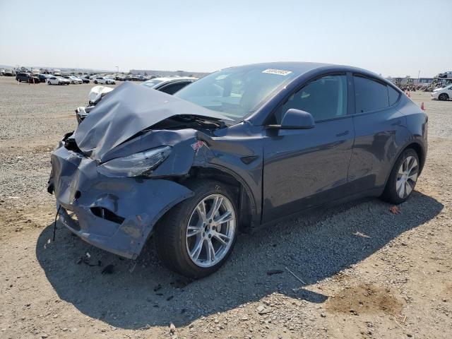 TESLA MODEL Y 2023 with VIN 7SAYGDED3PF962552 - Photo from auction