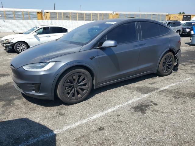 TESLA MODEL X 2018 with VIN 5YJXCBE23JF104464 - Photo from auction