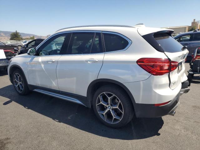 Photo 2 from auction – 2018 BMW X1 XDRIVE2 with VIN WBXHT3C30J3H32457