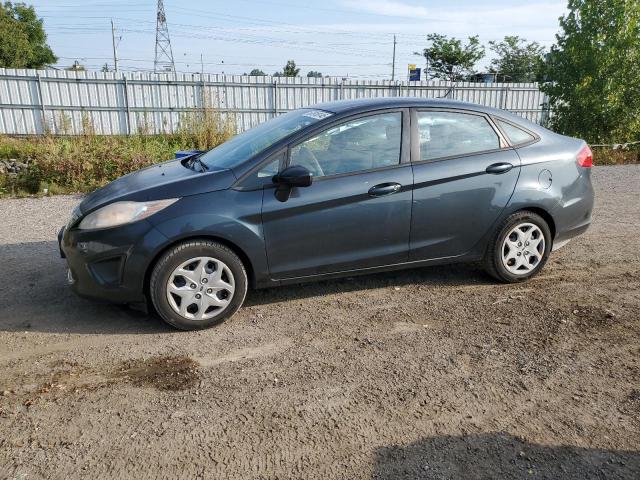 FORD FIESTA SE 2011 with VIN 3FADP4BJ8BM169506 - Photo from auction