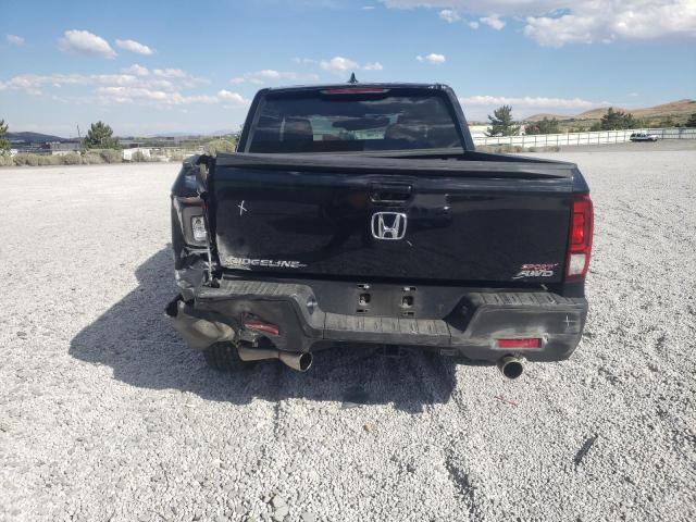 Photo 6 from auction – 2023 HONDA RIDGELINE with VIN 5FPYK3F12PB049170