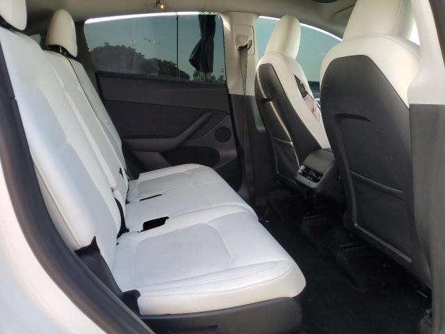 Photo 11 from auction – 2023 TESLA MODEL Y with VIN 7SAYGAEE2PF856195