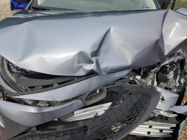 Photo 11 from auction – 2021 TOYOTA COROLLA LE with VIN 5YFEPMAE1MP165571
