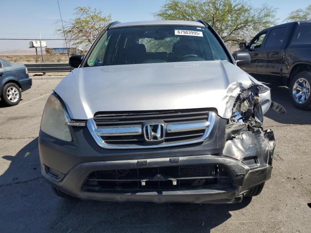 Photo 5 from auction – 2004 HONDA CR-V LX with VIN JHLRD68464C015034