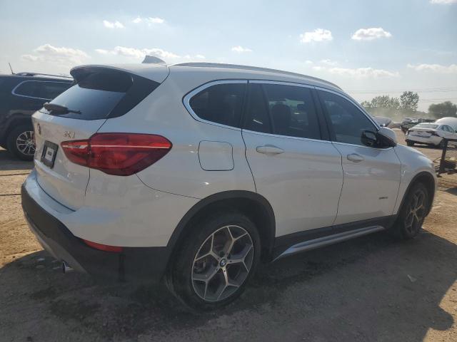 Photo 3 from auction – 2016 BMW X1 XDRIVE2 with VIN WBXHT3C31G5E49692