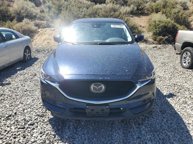Photo 5 from auction – 2018 MAZDA CX-5 TOURI with VIN JM3KFACM7J1400166